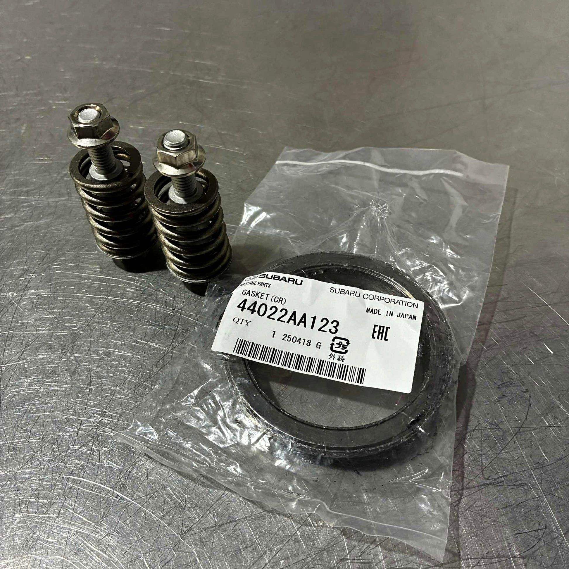 44022AA123, Subaru Genuine Exhaust Downpipe Doughnut Graphite Gasket and stainless steel spring bolt nut hardware